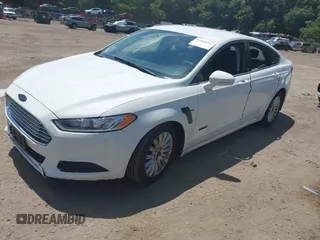 2013 Ford Fusion SE Hybrid with VIN 3FA6P0LU3DR328786, listed as a IAAI auction lot 42604212 with 132,423 mi miles and . Bid and sale history available at DreamBid. Image 2.