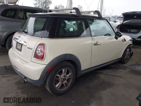 2013 MINI Hardtop with VIN WMWSU3C53DT684999, listed as a IAAI auction lot 42163800 with 89,774 mi miles and . Bid and sale history available at DreamBid. Image 4.