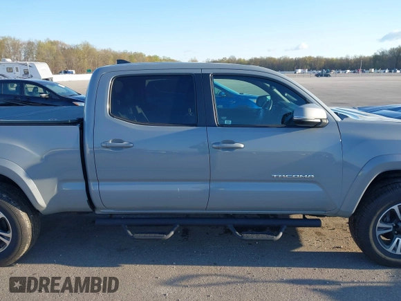 2018 Toyota Tacoma SR5 with VIN 3TMDZ5BN3JM054548, listed as a IAAI auction lot 42038480 with 122,242 mi miles and . Bid and sale history available at DreamBid. Image 13.