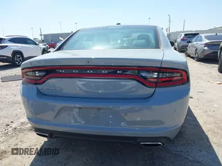 2022 Dodge Charger SXT with VIN 2C3CDXBG7NH204659, listed as a IAAI auction lot 41882695 with 49,773 mi miles and . Bid and sale history available at DreamBid. Image 17.