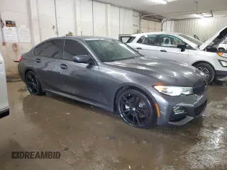 2019 BMW 3 Series 330i xDrive with VIN WBA5R7C57KAJ86027, listed as a Copart auction lot 61203435 with 41,486 mi miles and Salvage title. Bid and sale history available at DreamBid. Image 4.