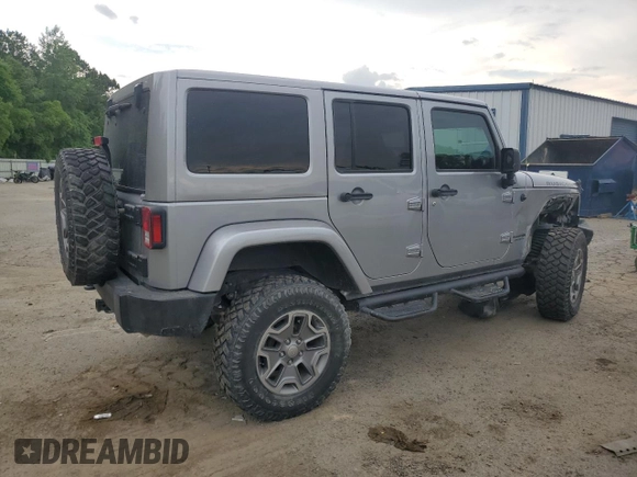 2018 Jeep Wrangler Unlimited Rubicon Recon z VIN 1C4HJWFGXJL840598, wystawiony jako Copart lot #59399595 z przebiegiem 63 298 mil mil oraz Szkoda całkowita • Salvage title. Historia ofert i sprzedaży dostępna na DreamBid. Obrazek 3.