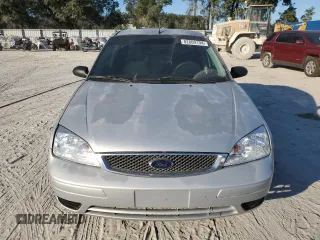 2005 Ford Focus S с VIN 1FAFP34N35W242854, выставлен на аукционе Copart как лот 55555065 с пробегом 180 171 миль миль и На запчасти • Non repairable. История ставок и продаж доступна на DreamBid. Изображение 5.