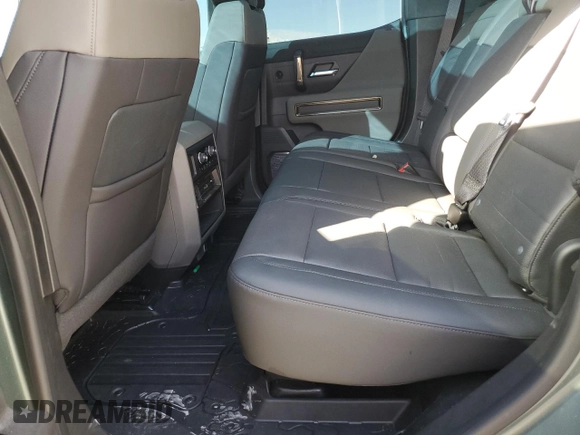 2024 GMC Hummer EV 3X z VIN 1GKB0RDC6RU103340, wystawiony jako Copart lot #79773874 z przebiegiem Nie podano mil oraz Szkody całkowita. Historia ofert i sprzedaży dostępna na DreamBid. Obrazek 11.