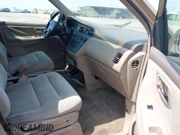 2000 Honda Odyssey EX with VIN 2HKRL1868YH513587, listed as a IAAI auction lot 42092115 with 302,555 mi miles and . Bid and sale history available at DreamBid. Image 5.