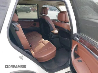 2011 BMW X5 35i with VIN 5UXZV4C54BL412770, listed as a IAAI auction lot 41618946 with 148,612 mi miles. Bid and sale history available at carsss.com. Image 8.