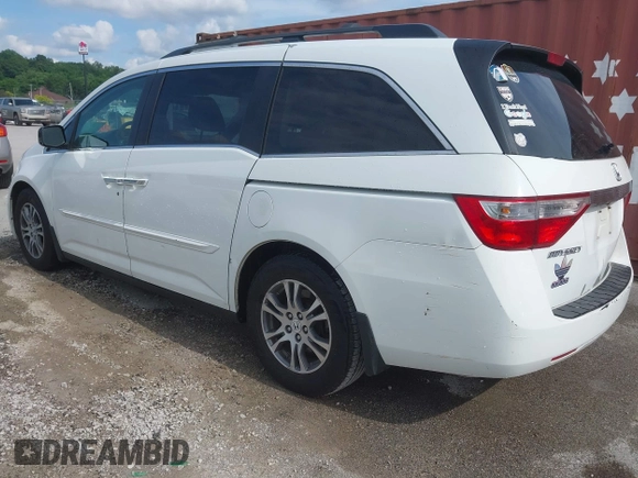 2011 Honda Odyssey EX-L with VIN 5FNRL5H60BB026171, listed as a IAAI auction lot 42511296 with 288,827 mi miles and . Bid and sale history available at DreamBid. Image 3.