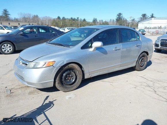 2006 Honda Civic Sdn EX with VIN 2HGFA16826H528610, listed as a IAAI auction lot 41694802 with 227,763 mi miles. Bid and sale history available at carsss.com. Image 2.