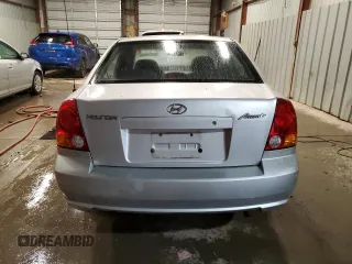 2004 Hyundai Accent GL with VIN KMHCG45C04U544804, listed as a Copart auction lot 72912984 with 121,178 mi miles and Salvage Title. Bid and sale history available at carsss.com. Image 6.