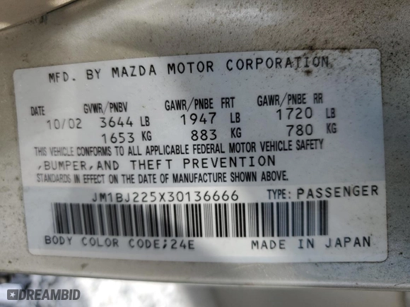 2003 Mazda Protege DX with VIN JM1BJ225X30136666, listed as a Copart auction lot 51496355 with 227,846 mi miles and Salvage Title. Bid and sale history available at carsss.com. Image 13.