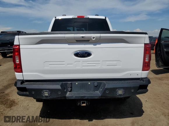 2021 Ford F-150 XL with VIN 1FTFW1E84MKD22275, listed as a Copart auction lot 56565655 with 92,867 mi miles and Salvage title. Bid and sale history available at DreamBid. Image 6.
