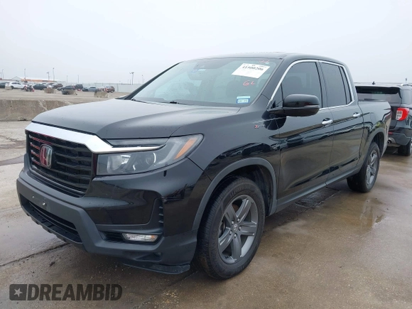2022 Honda Ridgeline RTL-E with VIN 5FPYK3F75NB020036, listed as a IAAI auction lot 41500206 with 79,655 mi miles and . Bid and sale history available at DreamBid. Image 2.