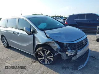 2023 Honda Odyssey Touring with VIN 5FNRL6H86PB020700, listed as a IAAI auction lot 41961098 with 66,512 mi miles and . Bid and sale history available at DreamBid. Image 6.