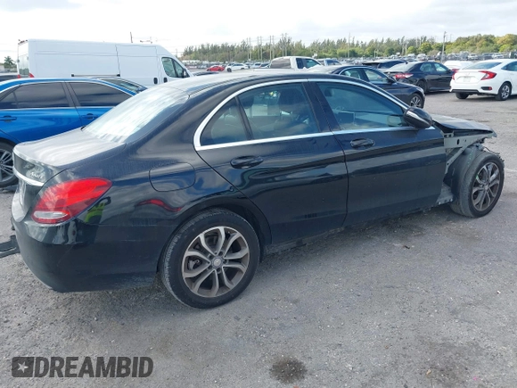 2015 Mercedes-Benz C 300 Luxury with VIN 55SWF4KB4FU000817, listed as a IAAI auction lot 41565974 with 102,223 mi miles and . Bid and sale history available at carsss.com. Image 4.