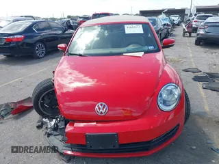 2015 Volkswagen Beetle 1.8T w/Tech with VIN 3VW517AT4FM803238, listed as a IAAI auction lot 41812373 with 42,369 mi miles and . Bid and sale history available at DreamBid. Image 12.