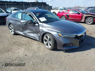 2018 Honda Accord Touring z VIN 1HGCV1F9XJA078650, wystawiony jako IAAI lot #41676467 z przebiegiem 43 054 mil mil oraz . Historia ofert i sprzedaży dostępna na DreamBid. Obrazek 1.