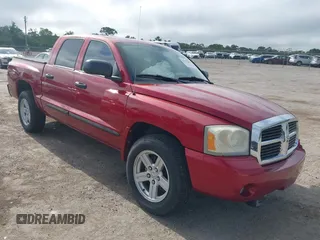 2007 Dodge Dakota SLT z VIN 1D7HW48K57S216736, wystawiony jako IAAI lot #42147254 z przebiegiem 38 397 mil mil oraz . Historia ofert i sprzedaży dostępna na DreamBid. Obrazek 1.
