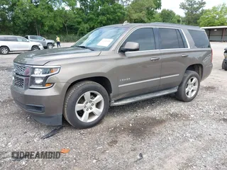 2015 Chevrolet Tahoe LT with VIN 1GNSCBKC5FR585138, listed as a IAAI auction lot 42420496 with 177,104 mi miles and . Bid and sale history available at DreamBid. Image 2.