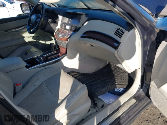 2011 Infiniti M37 with VIN JN1BY1AR6BM374647, listed as a IAAI auction lot 37949396 with 182,645 mi miles. Bid and sale history available at carsss.com. Image 5.