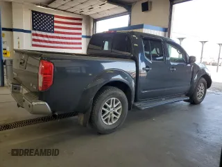 2014 Nissan Frontier SV with VIN 1N6AD0EV9EN710020, listed as a Copart auction lot 60895575 with 125,090 mi miles and Salvage title. Bid and sale history available at DreamBid. Image 3.