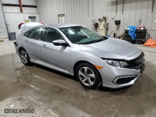 2019 Honda Civic Sedan LX with VIN 2HGFC2F69KH581653, listed as a Copart auction lot 87867265 with 101,353 mi miles and Salvage Title. Bid and sale history available at carsss.com. Image 4.