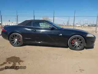 2007 Jaguar XK with VIN SAJDA44B375B02282, listed as a IAAI auction lot 42046463 with 117,595 mi miles. Bid and sale history available at carsss.com. Image 13.