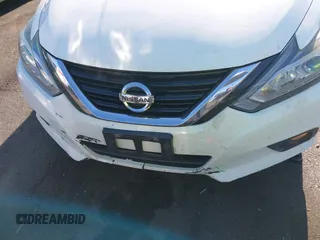 2018 Nissan Altima 2.5 S with VIN 1N4AL3AP8JC254733, listed as a IAAI auction lot 40212001 with 148,347 mi miles. Bid and sale history available at carsss.com. Image 13.