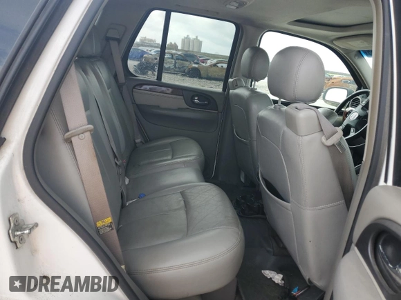2006 GMC Envoy SLE z VIN 1GKDS13S462144683, wystawiony jako Copart lot #58277565 z przebiegiem Nie podano mil oraz Czysty tytuł • Clean title. Historia ofert i sprzedaży dostępna na DreamBid. Obrazek 11.