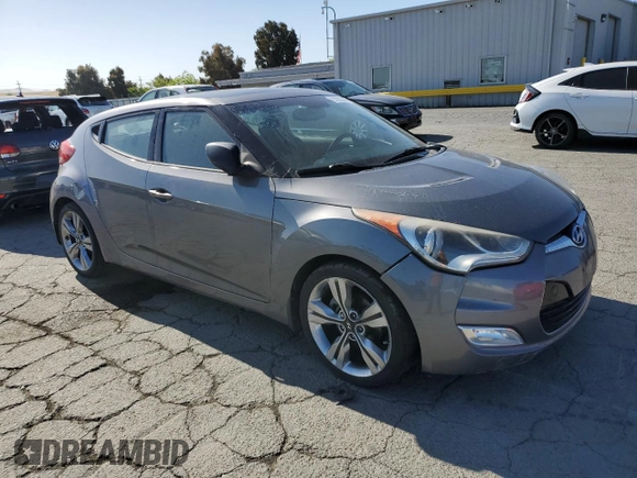 2012 Hyundai Veloster w/Gray Int z VIN KMHTC6AD9CU079542, wystawiony jako Copart lot #55998045 z przebiegiem 98 065 mil mil oraz Szkoda całkowita • Salvage title. Historia ofert i sprzedaży dostępna na DreamBid. Obrazek 4.