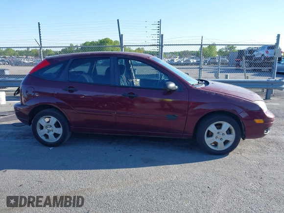 2007 Ford Focus S with VIN 1FAHP37N67W198470, listed as a IAAI auction lot 41990511 with 191,107 mi miles and . Bid and sale history available at carsss.com. Image 13.