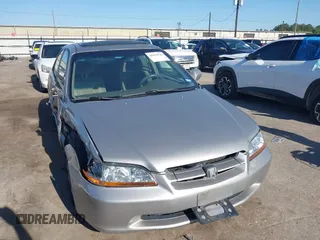 1999 Honda Accord EX z VIN JHMCG5650XC016960, wystawiony jako IAAI lot #41923520 z przebiegiem 247 389 mil mil oraz . Historia ofert i sprzedaży dostępna na DreamBid. Obrazek 1.
