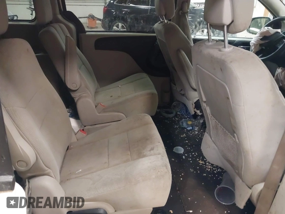 2012 Dodge Grand Caravan SXT with VIN 2C4RDGCG3CR405373, listed as a IAAI auction lot 41264407 with 164,019 mi miles and . Bid and sale history available at DreamBid. Image 8.