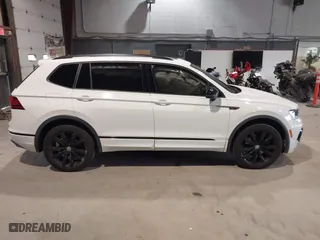 2020 Volkswagen Tiguan SE with VIN 3VV2B7AX1LM106600, listed as a IAAI auction lot 40259436 with 56,736 mi miles. Bid and sale history available at carsss.com. Image 13.