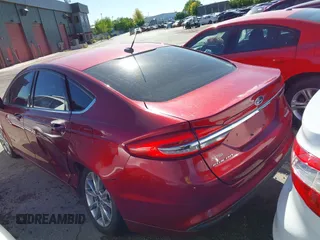 2017 Ford Fusion Hybrid SE with VIN 3FA6P0LU7HR317604, listed as a IAAI auction lot 42713039 with 302,322 mi miles and . Bid and sale history available at DreamBid. Image 3.