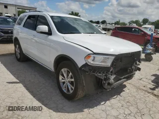 2015 Dodge Durango Limited with VIN 1C4RDJDGXFC170110, listed as a Copart auction lot 58037295 with 154,099 mi miles and Salvage title. Bid and sale history available at DreamBid. Image 4.