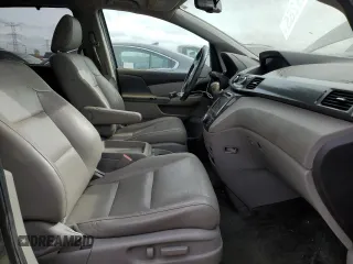 2014 Honda Odyssey Touring с VIN 5FNRL5H98EB029561, выставлен на аукционе Copart как лот 57349265 с пробегом 136 233 миль миль и Списание • Salvage title. История ставок и продаж доступна на DreamBid. Изображение 7.