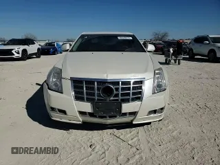 2013 Cadillac CTS Premium z VIN 1G6DP5E33D0153588, wystawiony jako Copart lot #46529515 z przebiegiem 103 980 mil mil oraz Czysty tytuł • Clean title. Historia ofert i sprzedaży dostępna na DreamBid. Obrazek 11.