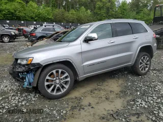 2018 Jeep Grand Cherokee Overland z VIN 1C4RJFCTXJC108624, wystawiony jako Copart lot #53738094 z przebiegiem 83 040 mil mil oraz . Historia ofert i sprzedaży dostępna na DreamBid. Obrazek 1.