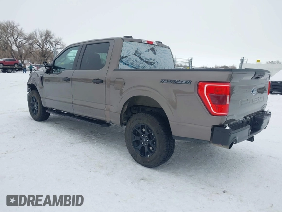 2023 Ford F-150 XL with VIN 1FTFW1E85PFA33757, listed as a IAAI auction lot 41266489 with 8,655 mi miles. Bid and sale history available at carsss.com. Image 3.