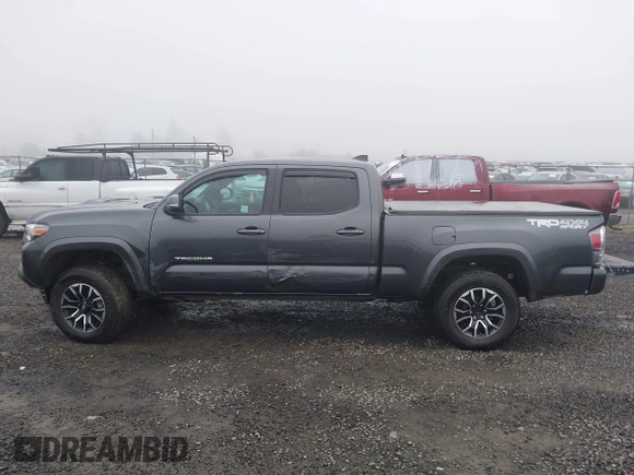 2021 Toyota Tacoma 4WD SR5 with VIN 3TMDZ5BN4MM099423, listed as a IAAI auction lot 41208397 with 62,935 mi miles. Bid and sale history available at carsss.com. Image 15.