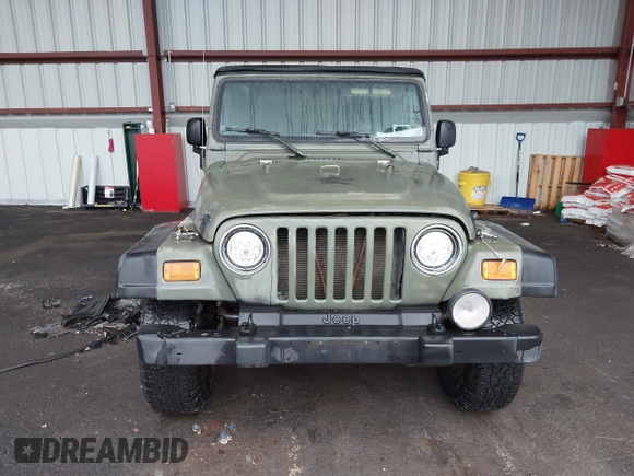 2005 Jeep Wrangler X z VIN 1J4FA39S75P310037, wystawiony jako IAAI lot #42186114 z przebiegiem 154 462 mil mil oraz . Historia ofert i sprzedaży dostępna na DreamBid. Obrazek 12.