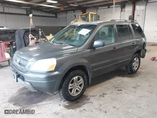 2005 Honda Pilot EX-L with RES with VIN 2HKYF18655H521175, listed as a IAAI auction lot 41490812 with 357,033 mi miles. Bid and sale history available at carsss.com. Image 2.