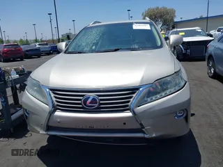 2015 Lexus RX 450h with VIN 2T2BC1BA0FC007066, listed as a IAAI auction lot 42462987 with 91,800 mi miles and . Bid and sale history available at DreamBid. Image 12.