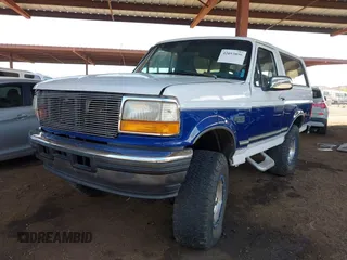 1996 Ford Bronco Custom with VIN 1FMEU15H3TLB30609, listed as a IAAI auction lot 42053896 with 238,597 mi miles. Bid and sale history available at carsss.com. Image 2.
