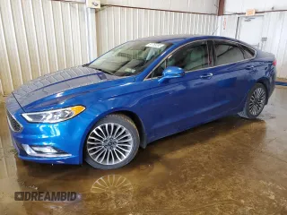 2017 Ford Fusion Titanium z VIN 3FA6P0D99HR162354, wystawiony jako Copart lot #61753395 z przebiegiem 100 678 mil mil oraz Szkoda całkowita • Salvage title. Historia ofert i sprzedaży dostępna na DreamBid. Obrazek 1.