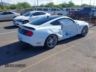 2021 Ford Mustang GT z VIN 1FA6P8CF5M5142279, wystawiony jako IAAI lot #42165065 z przebiegiem 30 109 mil mil oraz . Historia ofert i sprzedaży dostępna na DreamBid. Obrazek 4.