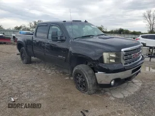2012 GMC Sierra 2500HD SLT with VIN 1GT121E89CF142433, listed as a Copart auction lot 71720594 with 171,967 mi miles and Salvage title. Bid and sale history available at DreamBid. Image 4.