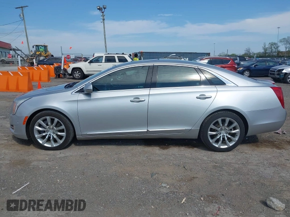 2016 Cadillac XTS Luxury Collection z VIN 2G61M5S33G9107107, wystawiony jako IAAI lot #42072608 z przebiegiem 130 542 mil mil oraz . Historia ofert i sprzedaży dostępna na DreamBid. Obrazek 14.