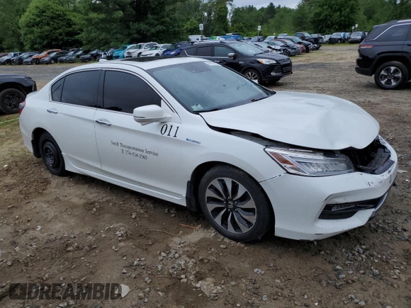 2017 Honda Accord Touring with VIN JHMCR6F76HC013354, listed as a Copart auction lot 61572385 with 223,100 mi miles and Salvage title. Bid and sale history available at DreamBid. Image 4.