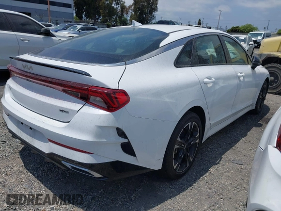 2023 Kia K5 GT-Line z VIN 5XXG64J25PG220733, wystawiony jako IAAI lot #42109640 z przebiegiem 30 917 mil mil oraz . Historia ofert i sprzedaży dostępna na DreamBid. Obrazek 4.